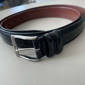 Black mens belt, silver buckle  52 inches long